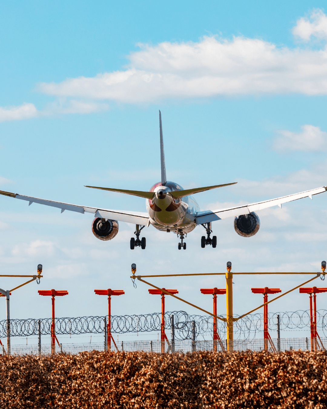 Passenger aircraft landing at an airport — St Leonards to Heathrow Airport transfers