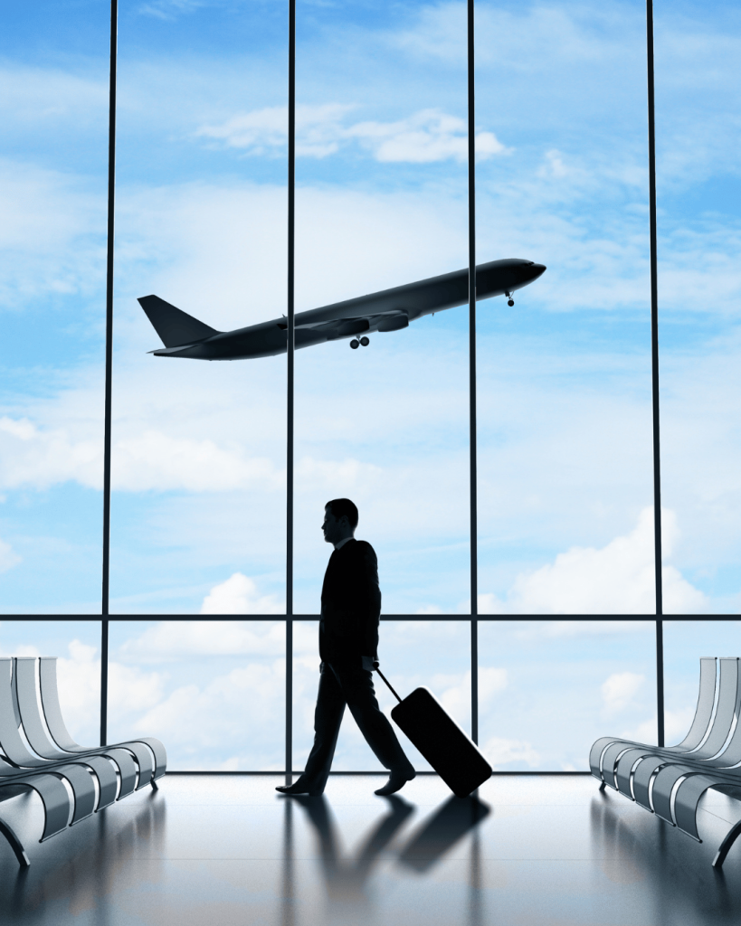 Man in airport with luggage